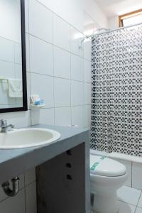 Um banheiro em Hotel El Huacachinero