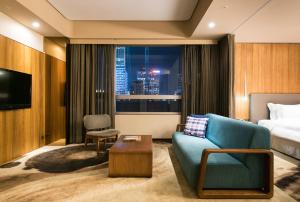 Televisyen dan/atau pusat hiburan di Home Hotel