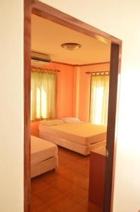 Postel nebo postele na pokoji v ubytování Pama Resort