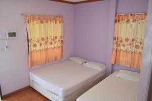 Postel nebo postele na pokoji v ubytování Pama Resort