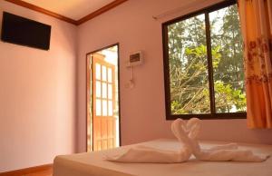 Postel nebo postele na pokoji v ubytování Pama Resort