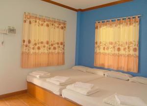 Postel nebo postele na pokoji v ubytování Pama Resort