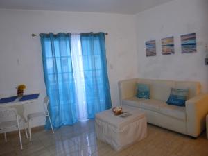 Posezení v ubytování CortLang Vacation Rentals, El Pueblito