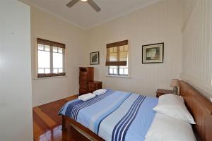 Ένα ή περισσότερα κρεβάτια σε δωμάτιο στο Billys Beach House Elliott Heads