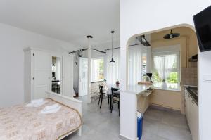TV a/nebo společenská místnost v ubytování Apartments Marija G