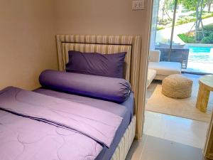 Postel nebo postele na pokoji v ubytování Veranda pool access 2BR family Huahin