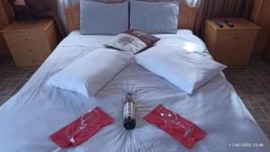 A bed or beds in a room at La Petri Studios with Fireplace & View