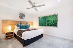Postel nebo postele na pokoji v ubytování ULTIQA Fiji Palms Beach Resort