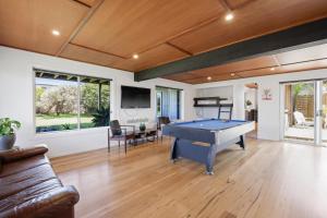 a living room with a pool table in it at Island Getaway Cape Woolamai in Cape Woolamai