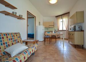 A kitchen or kitchenette at Ville Battiston