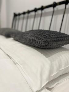 En eller flere senge i et værelse på Apart City Center