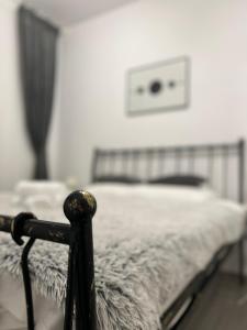 En eller flere senge i et værelse på Apart City Center