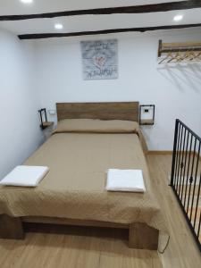 En eller flere senge i et værelse på IL Conte a Casa