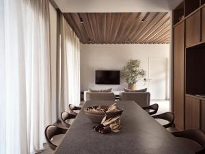 A television and/or entertainment centre at Cielo villas - An Authentic Mediterranean Living