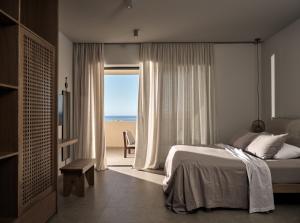 A bed or beds in a room at Cielo villas - An Authentic Mediterranean Living
