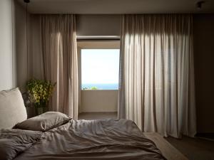A bed or beds in a room at Cielo villas - An Authentic Mediterranean Living