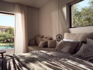 A bed or beds in a room at Cielo villas - An Authentic Mediterranean Living