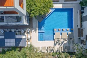 Bazén v ubytování Atrium Ambiance Hotel nebo v jeho okolí