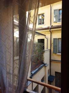 a view from a window of a building at Loft Garibaldi in Correggio +6 photos