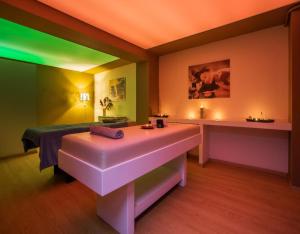 Posteľ alebo postele v izbe v ubytovaní Porto Bello Beach Hotel