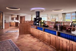 Lounge nebo bar v ubytování Posthotel Erlerwirt