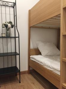 Posteľ alebo postele v izbe v ubytovaní Appartement Familial Au Coeur du Marais