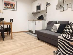 Kuchyňa alebo kuchynka v ubytovaní Appartement Familial Au Coeur du Marais
