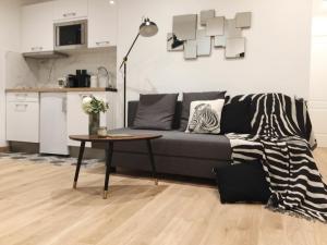 Kuchyňa alebo kuchynka v ubytovaní Appartement Familial Au Coeur du Marais