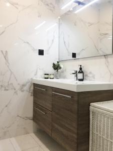 Kúpeľňa v ubytovaní Appartement Familial Au Coeur du Marais