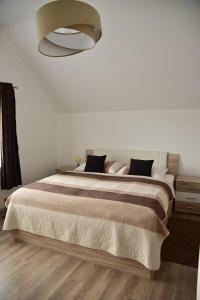 Postel nebo postele na pokoji v ubytování Apartmán Lukov