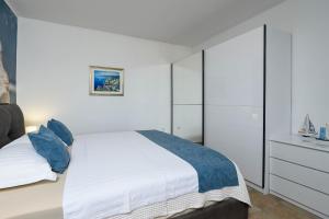 Postel nebo postele na pokoji v ubytování Holiday Villa Perna