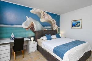 Postel nebo postele na pokoji v ubytování Holiday Villa Perna