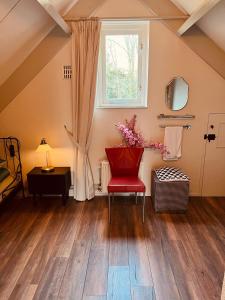 Χώρος καθιστικού στο Supergezellig vakantiehuis met hele grote tuin bij Nijmegen