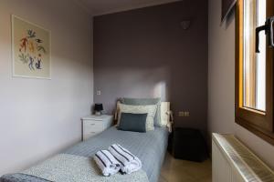 Posteľ alebo postele v izbe v ubytovaní VILLA SMARAGDA