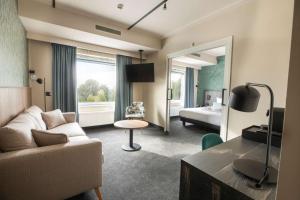 Posezení v ubytování Flonk Hotel Groningen Zuid, BW Signature Collection