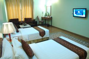 Katil atau katil-katil dalam bilik di Best Western Green Hill Hotel