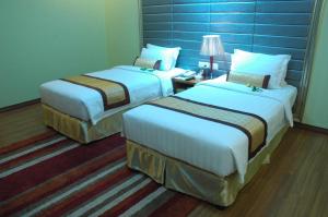 Katil atau katil-katil dalam bilik di Best Western Green Hill Hotel