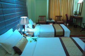 Katil atau katil-katil dalam bilik di Best Western Green Hill Hotel