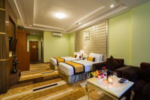 Katil atau katil-katil dalam bilik di Best Western Green Hill Hotel