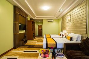 Televisyen dan/atau pusat hiburan di Best Western Green Hill Hotel