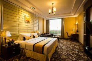Televisyen dan/atau pusat hiburan di Best Western Green Hill Hotel