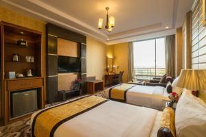 Katil atau katil-katil dalam bilik di Best Western Green Hill Hotel