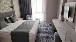 TV a/nebo společenská místnost v ubytování Yeşilyurt Park Otel