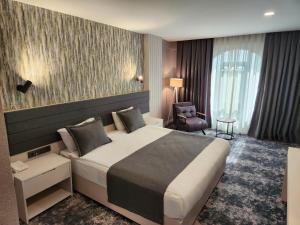 Postel nebo postele na pokoji v ubytování Yeşilyurt Park Otel