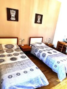 Postel nebo postele na pokoji v ubytování Albergo pizzeria 76 06 + 2 fotografie