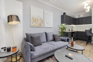 Posedenie v ubytovaní Gdynia Plac Unii Śródmieście Apartment by Noclegi Renters