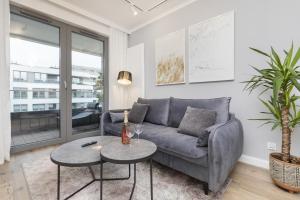 Posedenie v ubytovaní Gdynia Plac Unii Śródmieście Apartment by Noclegi Renters