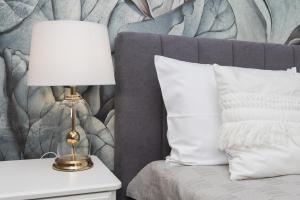 Posteľ alebo postele v izbe v ubytovaní Gdynia Plac Unii Śródmieście Apartment by Noclegi Renters
