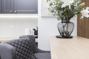 Posedenie v ubytovaní Gdynia Plac Unii Śródmieście Apartment by Noclegi Renters