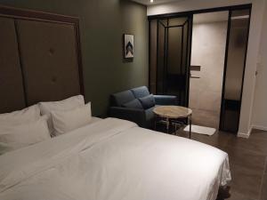 Postel nebo postele na pokoji v ubytování Brown Dot Hotel Busan Station